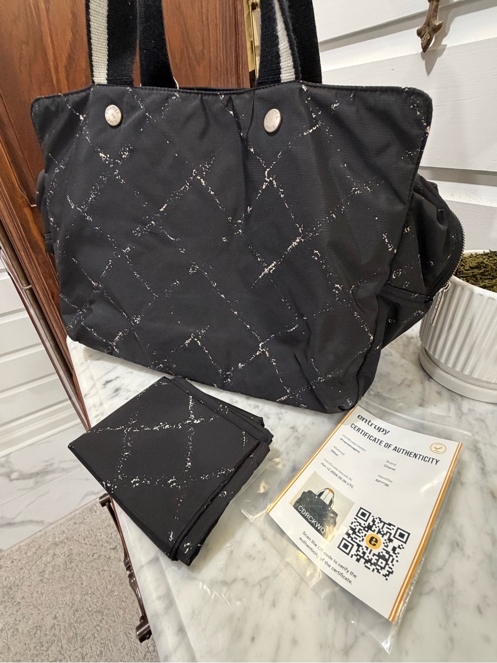 CHANEL Black Quilted Tote with Striped Shoulder Straps